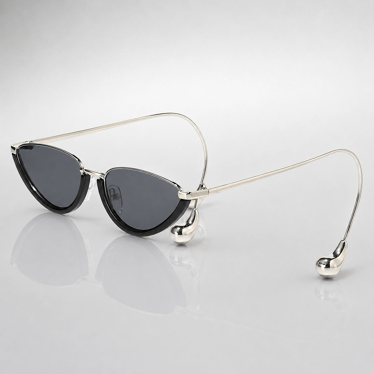 Halvra Cat-Eye Sunglasses — Black And Silver Frame All Gray Piece (sunglasses hero)