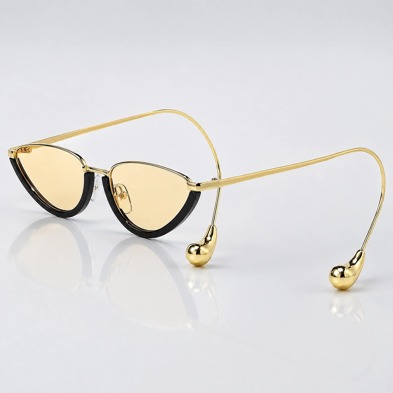 Halvra Cat-Eye Sunglasses — Black Frame Light Tea Slices (sunglasses hero)