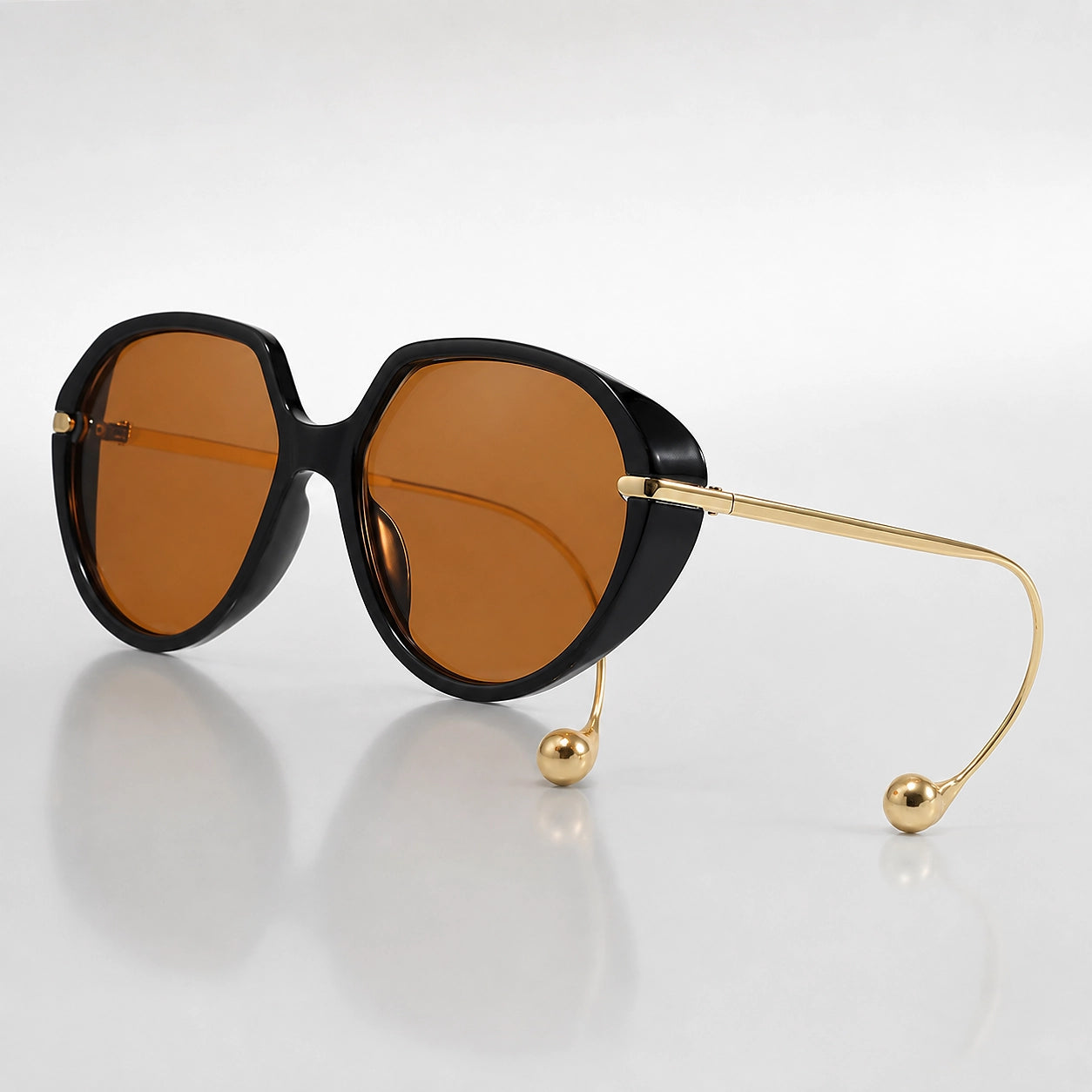 Halvara Brioso Sunglasses — Black Frame Tea Tinted Lenses (sunglasses hero)