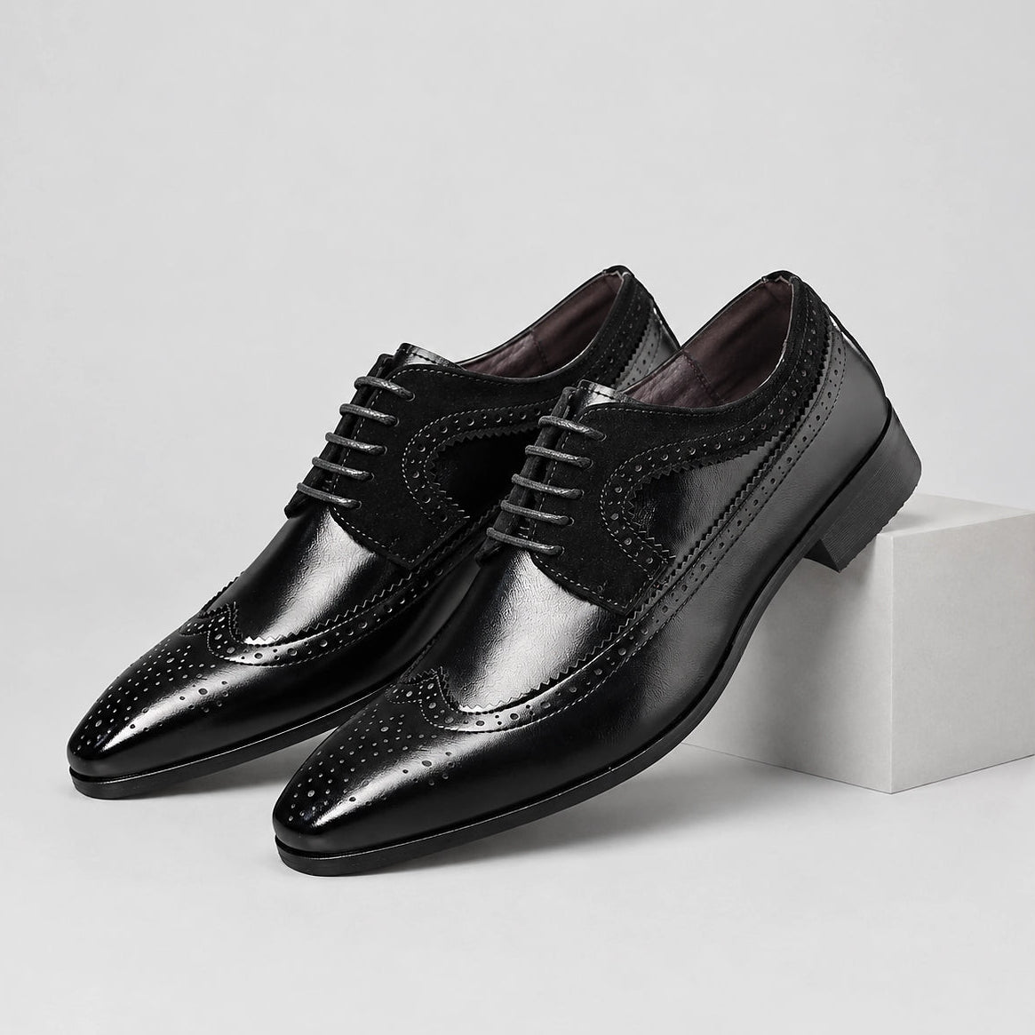 Dalvren Leather Brogue Derby — Black (mens shoe pedestal)