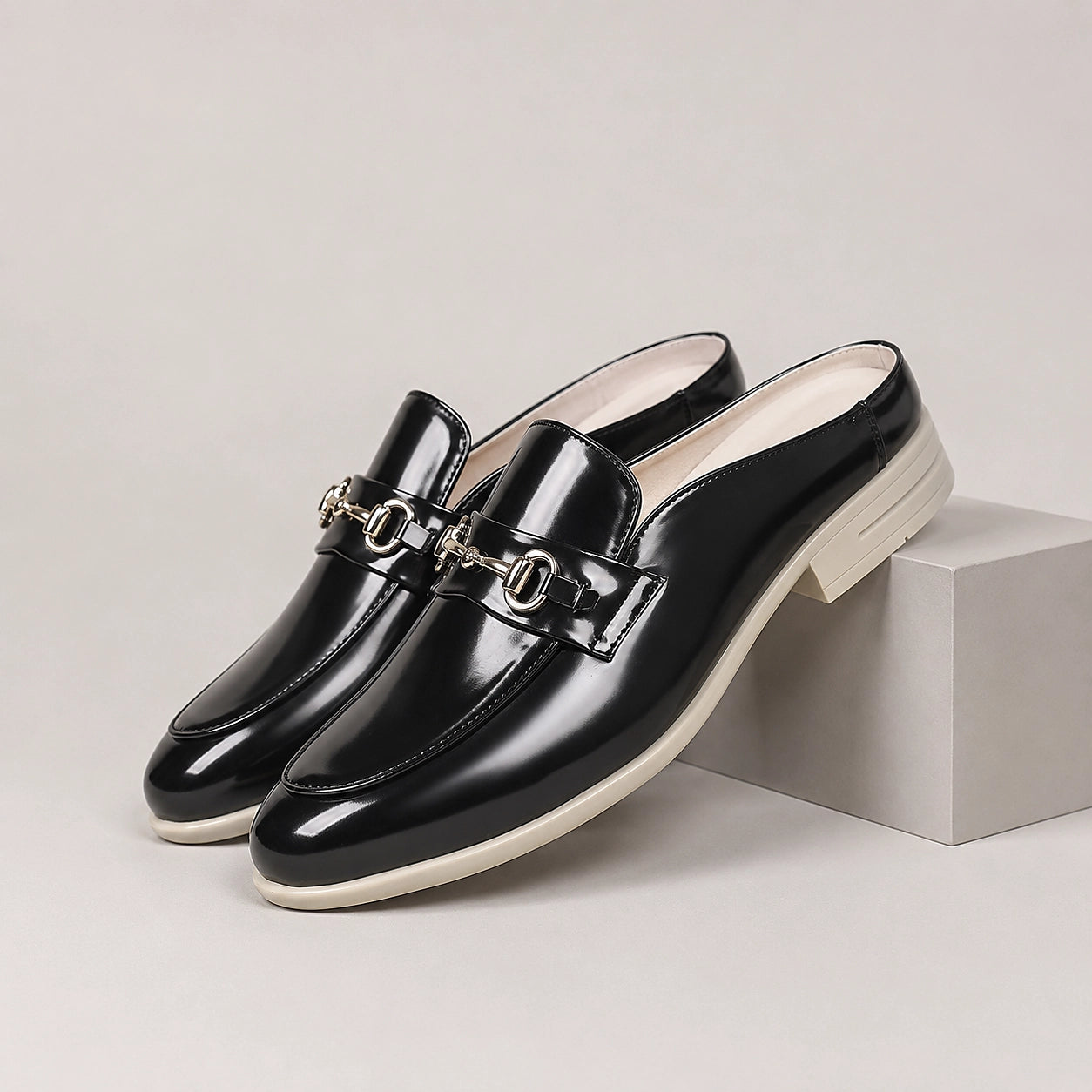 Halcourt Leather Horsebit Mule — Black (mens shoe pedestal)