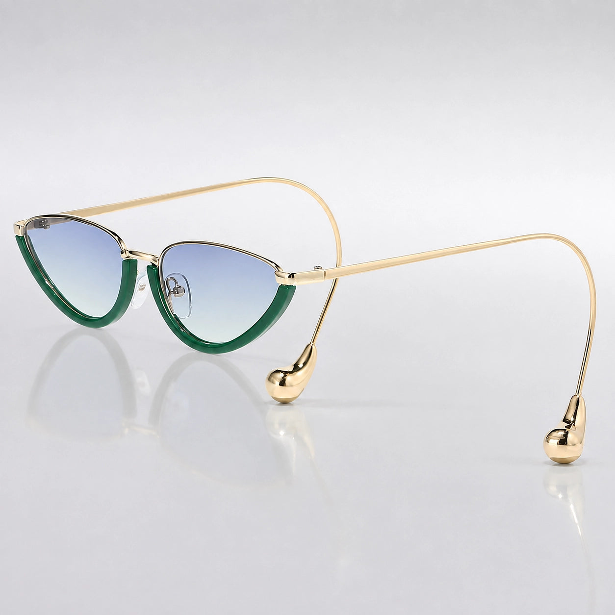 Halvra Cat-Eye Sunglasses — Green Gold Framed Blue Tea Slices (sunglasses hero)