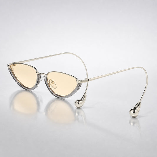 Halvra Cat-Eye Sunglasses — Transparent Gray Framed Champagne Slices (sunglasses hero)