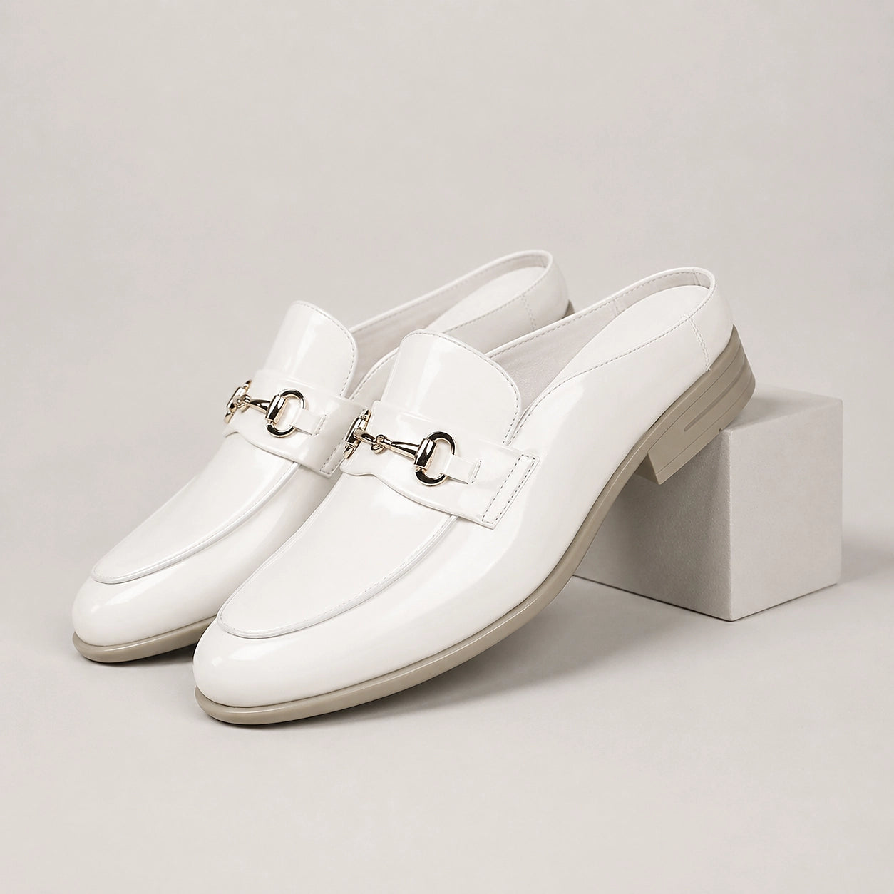 Halcourt Leather Horsebit Mule — White (mens shoe pedestal)